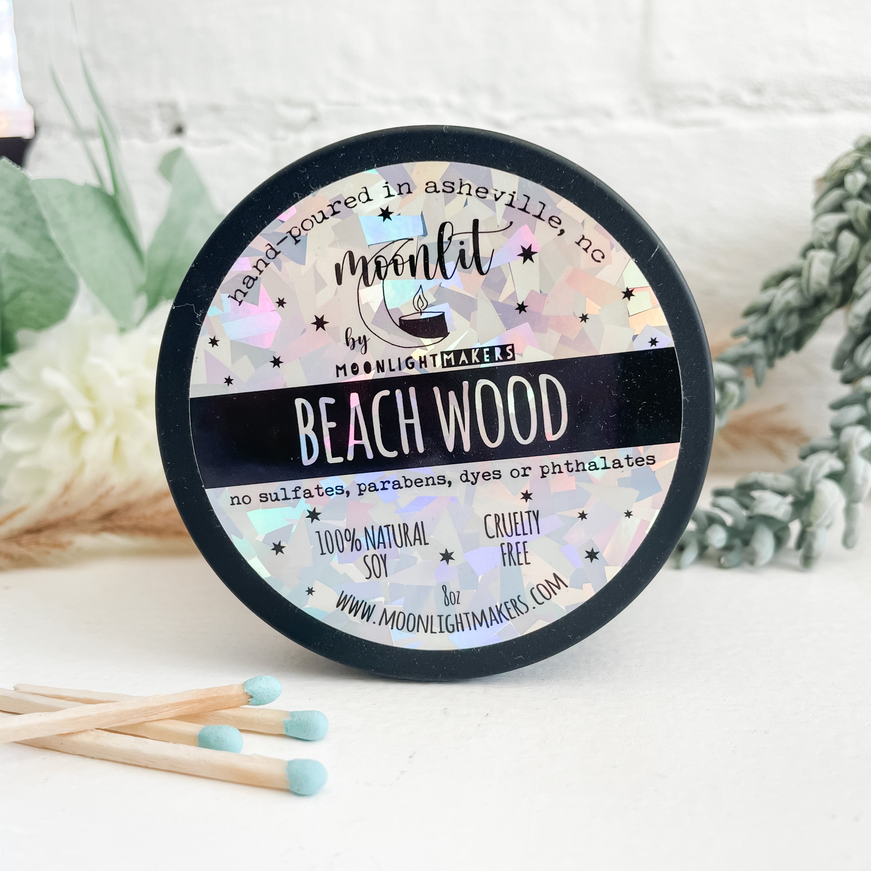 a close up of a jar of beach wood