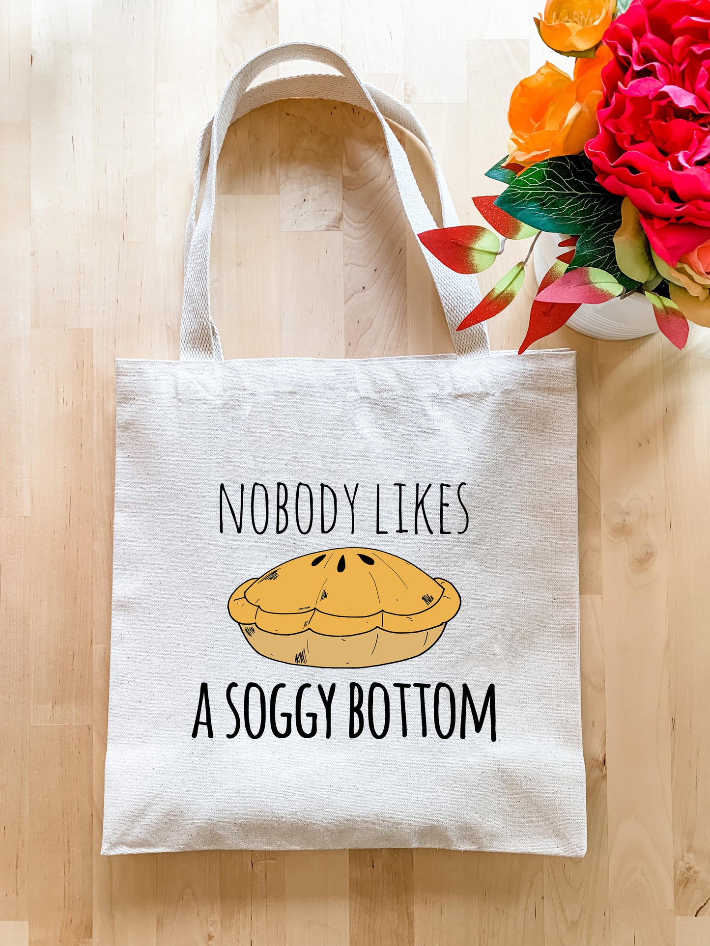 a tote bag that says nobody likes a soggy bottom