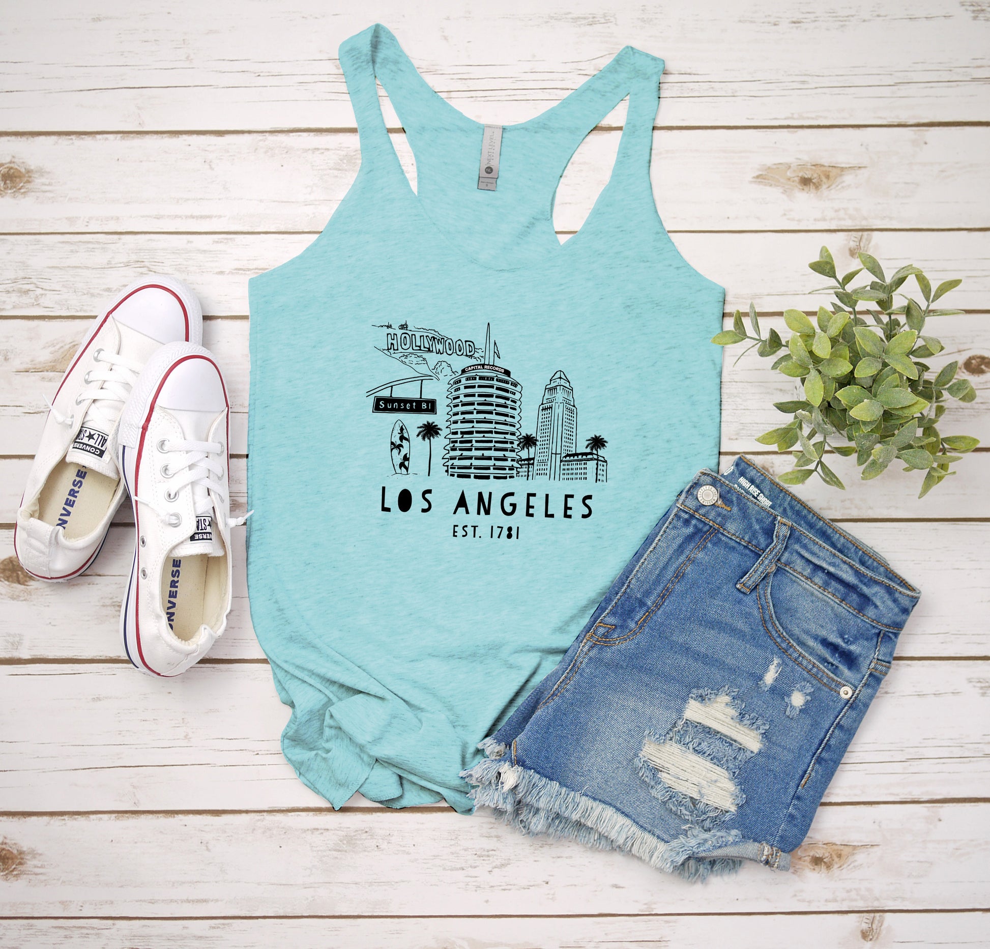 a women's tank top with the los angeles skyline on it