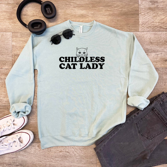 a sweatshirt that says,'childless cat lady'next to a pair of