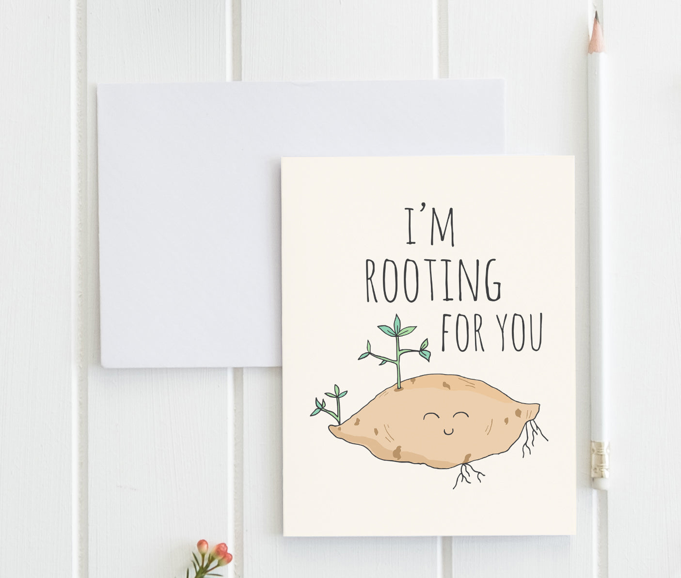 a card with a picture of a potato on it