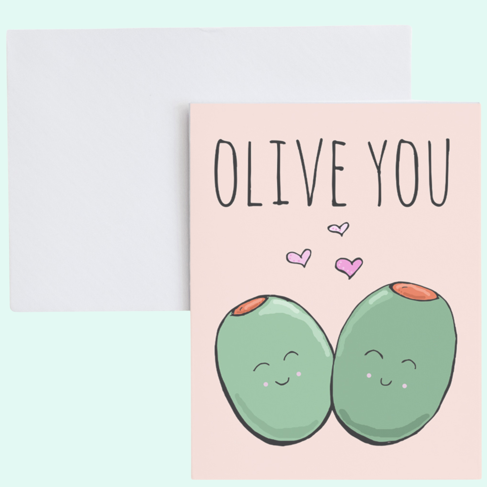 a greeting card with two green apples on it