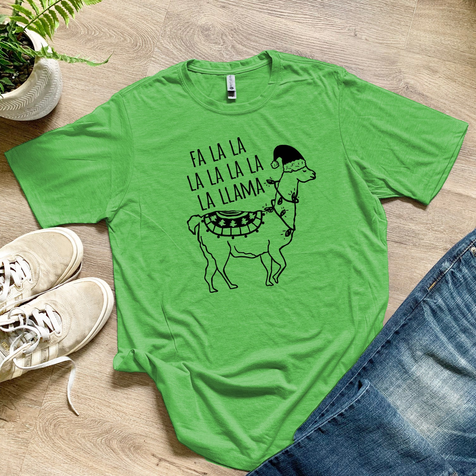 a green t - shirt with a picture of a llama on it