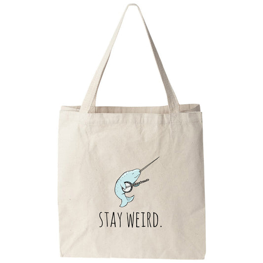 a tote bag that says stay weird