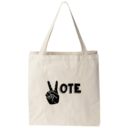 a tote bag with a peace sign on it