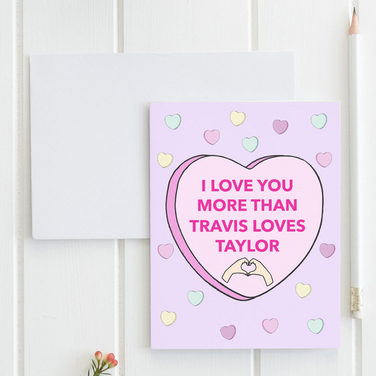 a greeting card with a pink heart and i love you more than travis loves taylor