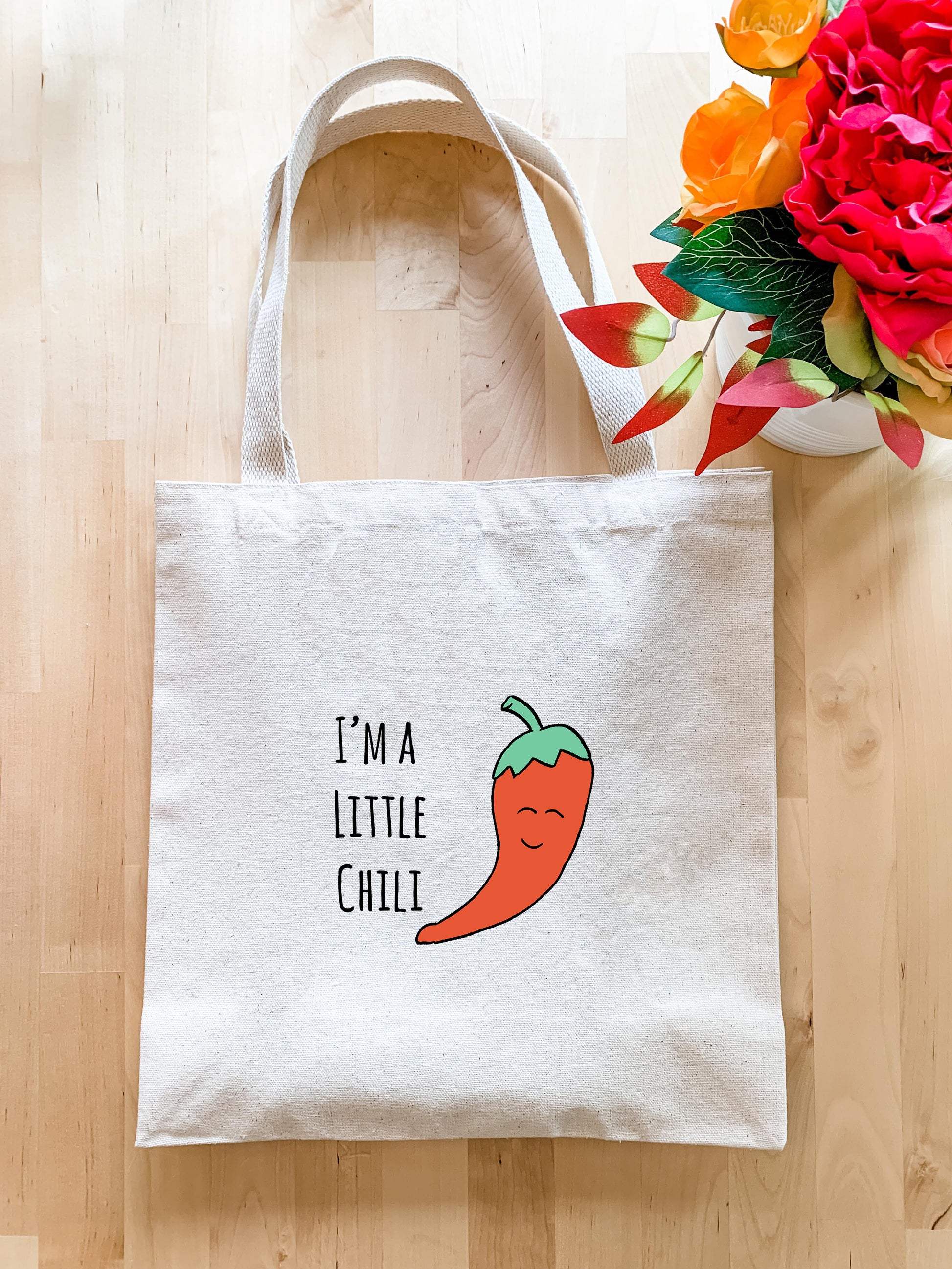 a white bag with a picture of a chili on it