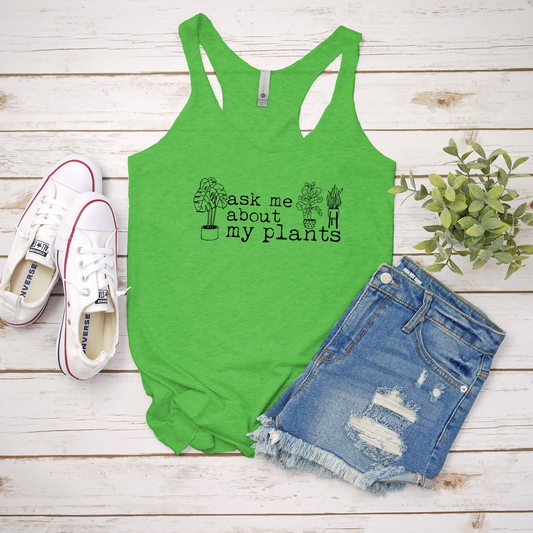 a green tank top that says teach me about my plants