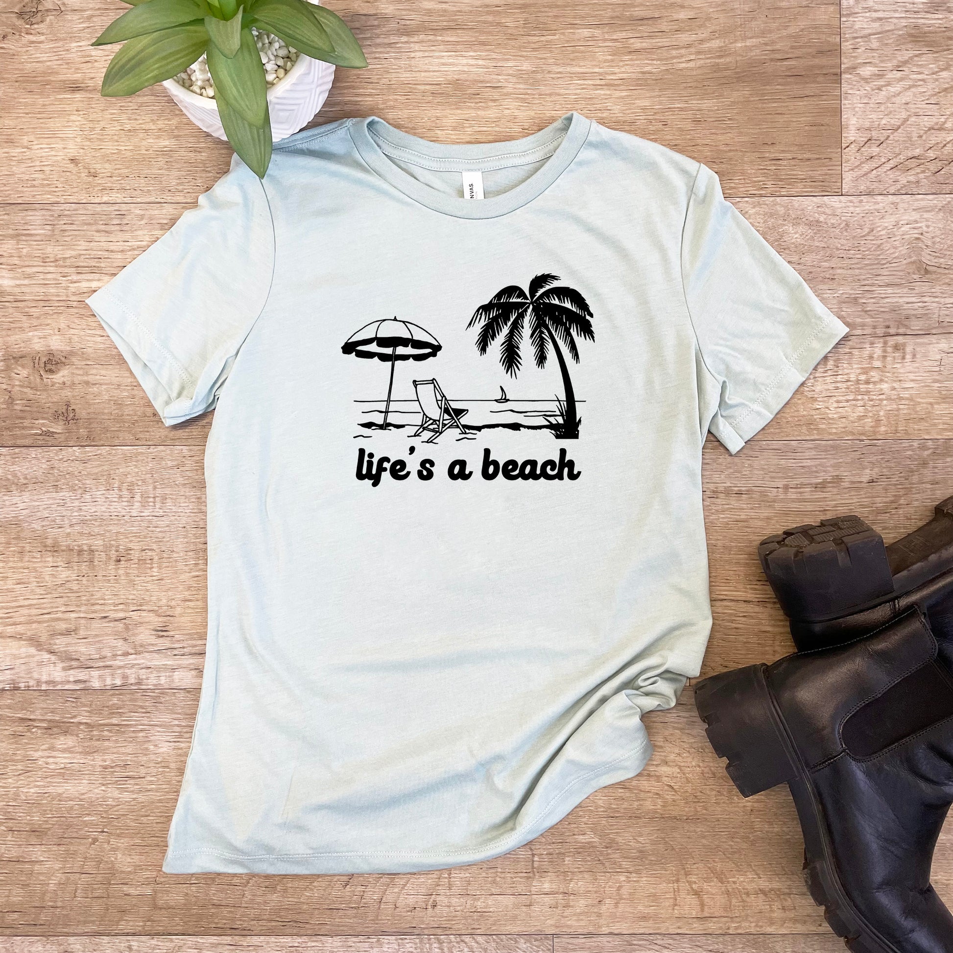 a t - shirt that says life's a beach with a beach chair and