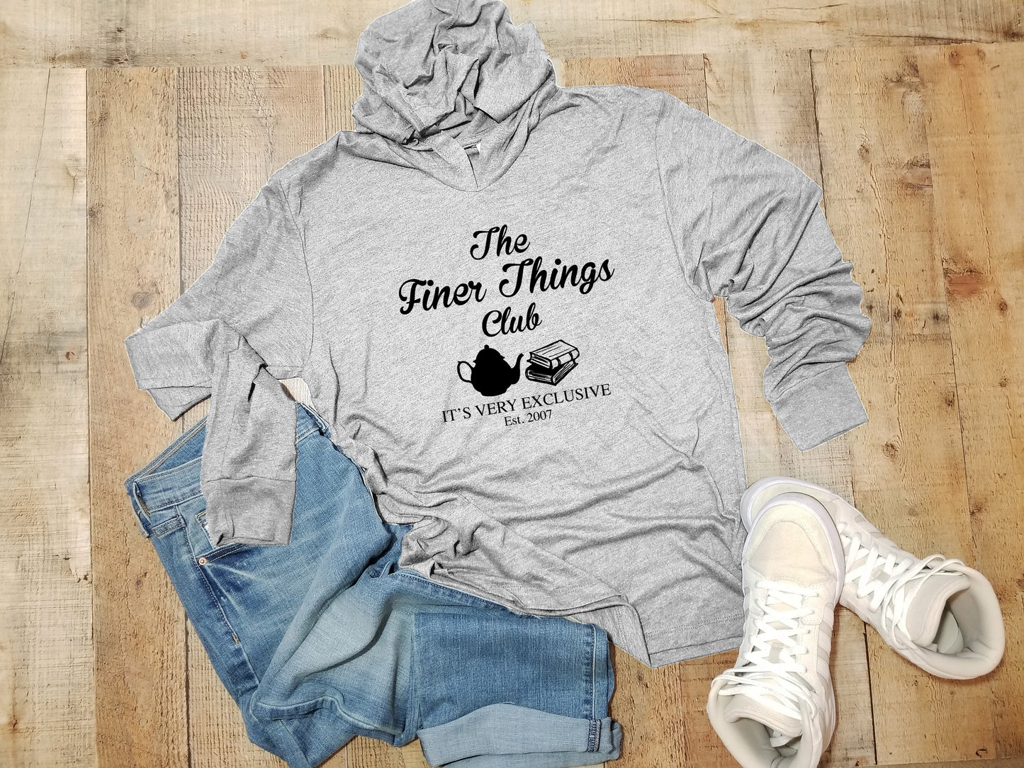 a grey hoodie with the words the inner things club on it