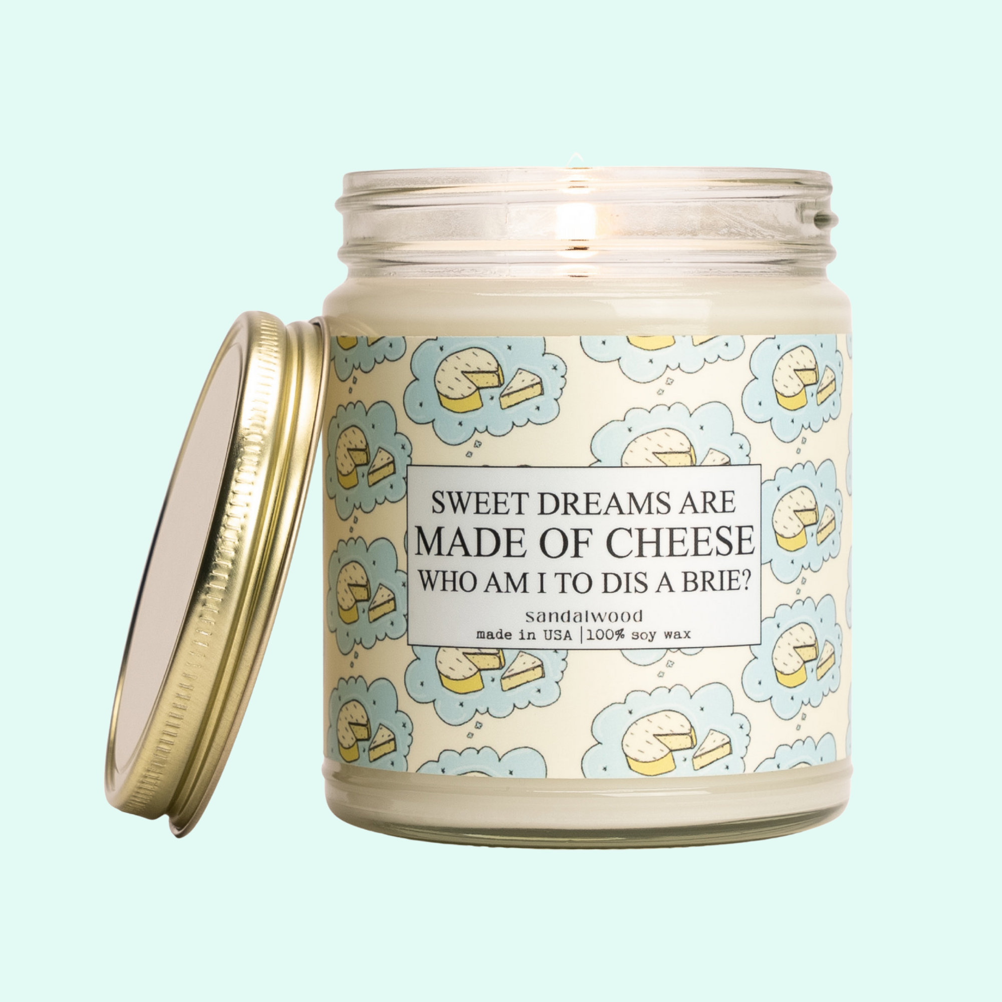 a jar of cheese with a lid on a blue background