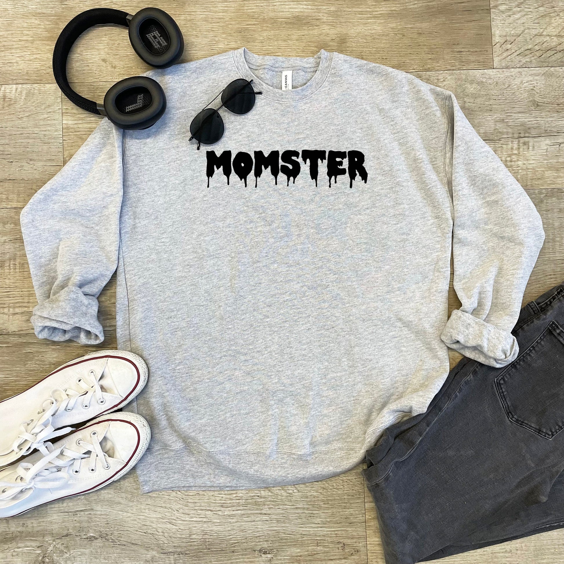 a sweatshirt with headphones and a pair of headphones