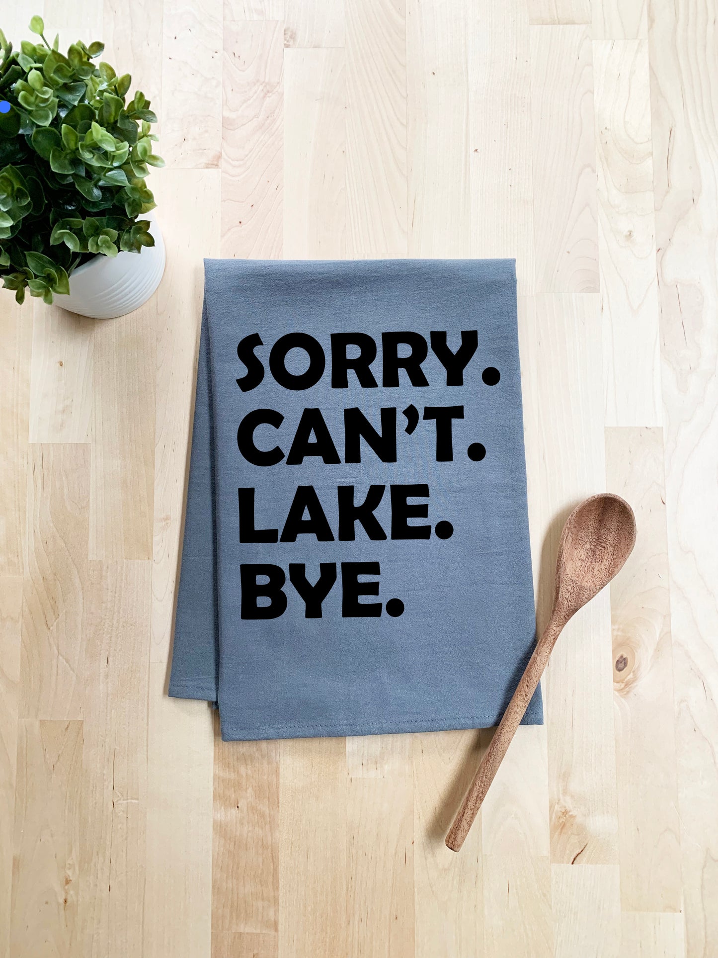 a tea towel that says sorry can't lake bye