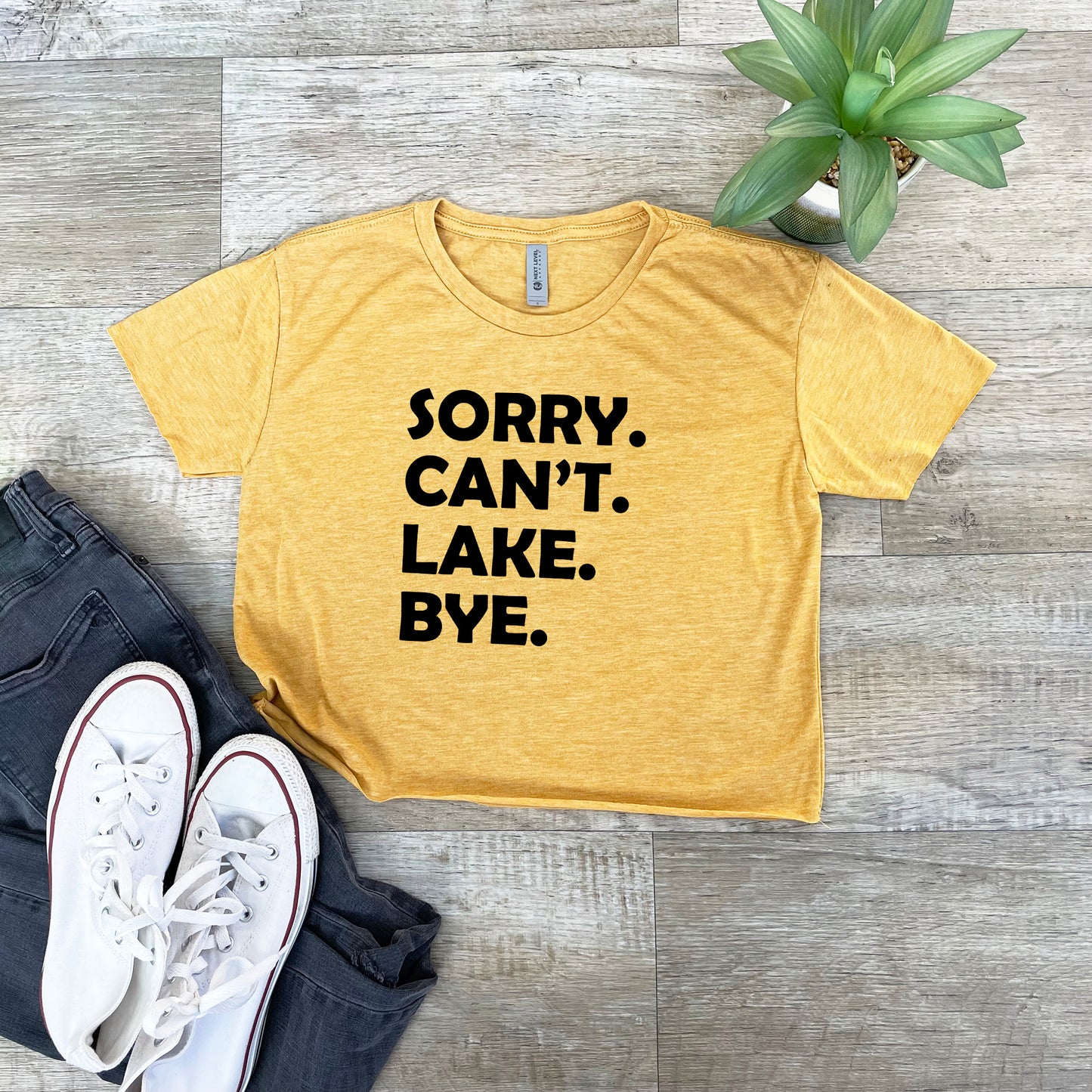 a t - shirt that says sorry can't lake bye