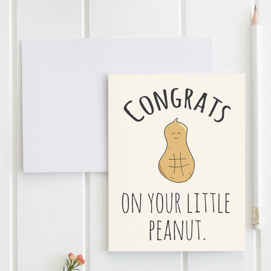 a card that says congrats on your little peanut