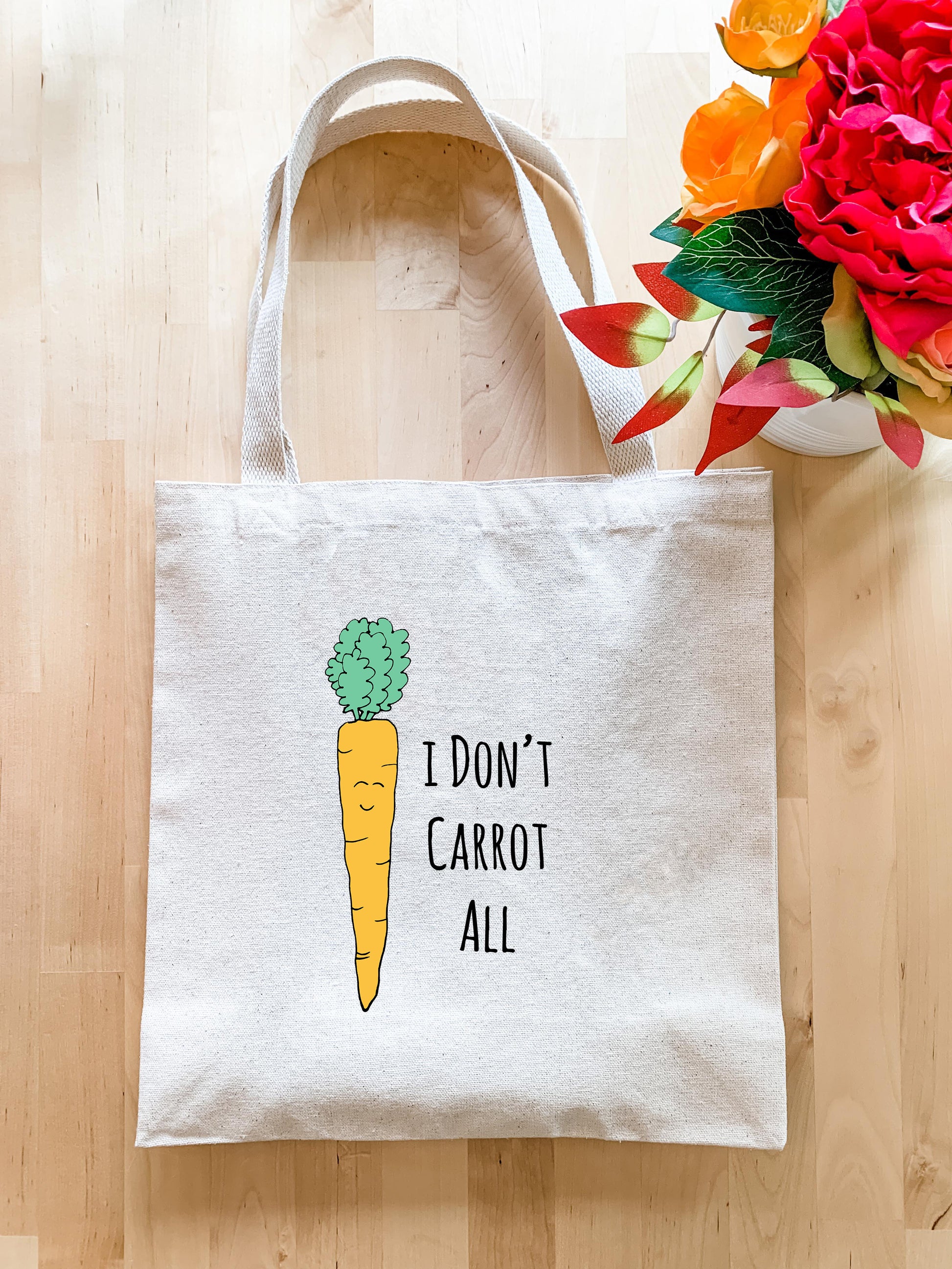 a white bag with a carrot drawn on it