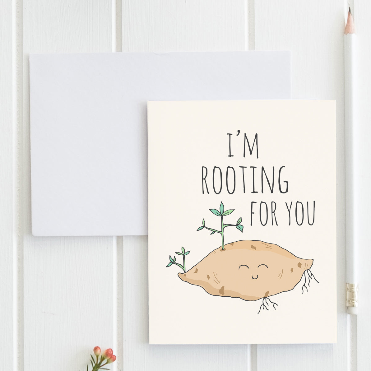 a card with a picture of a potato on it