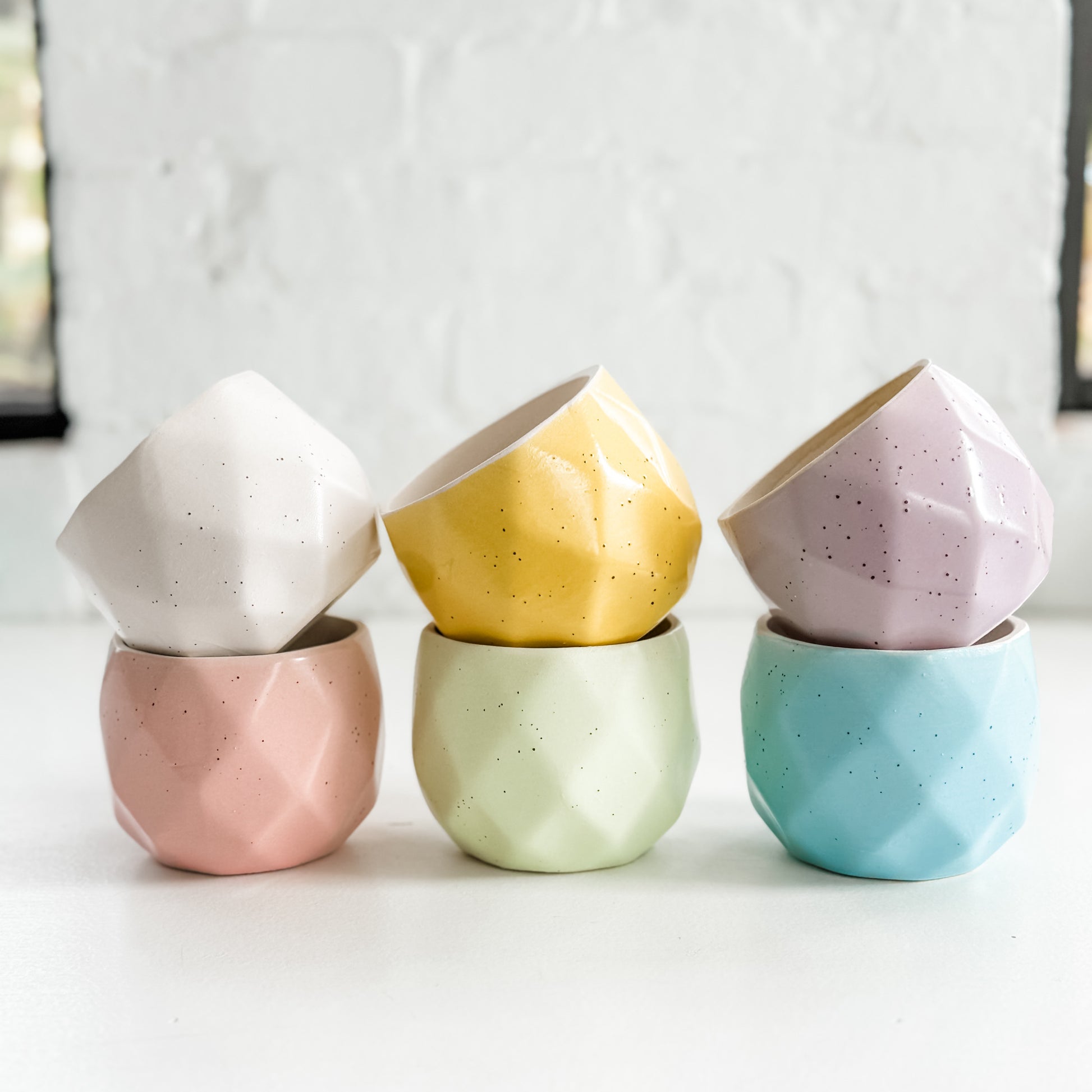 a group of three bowls sitting on top of a table