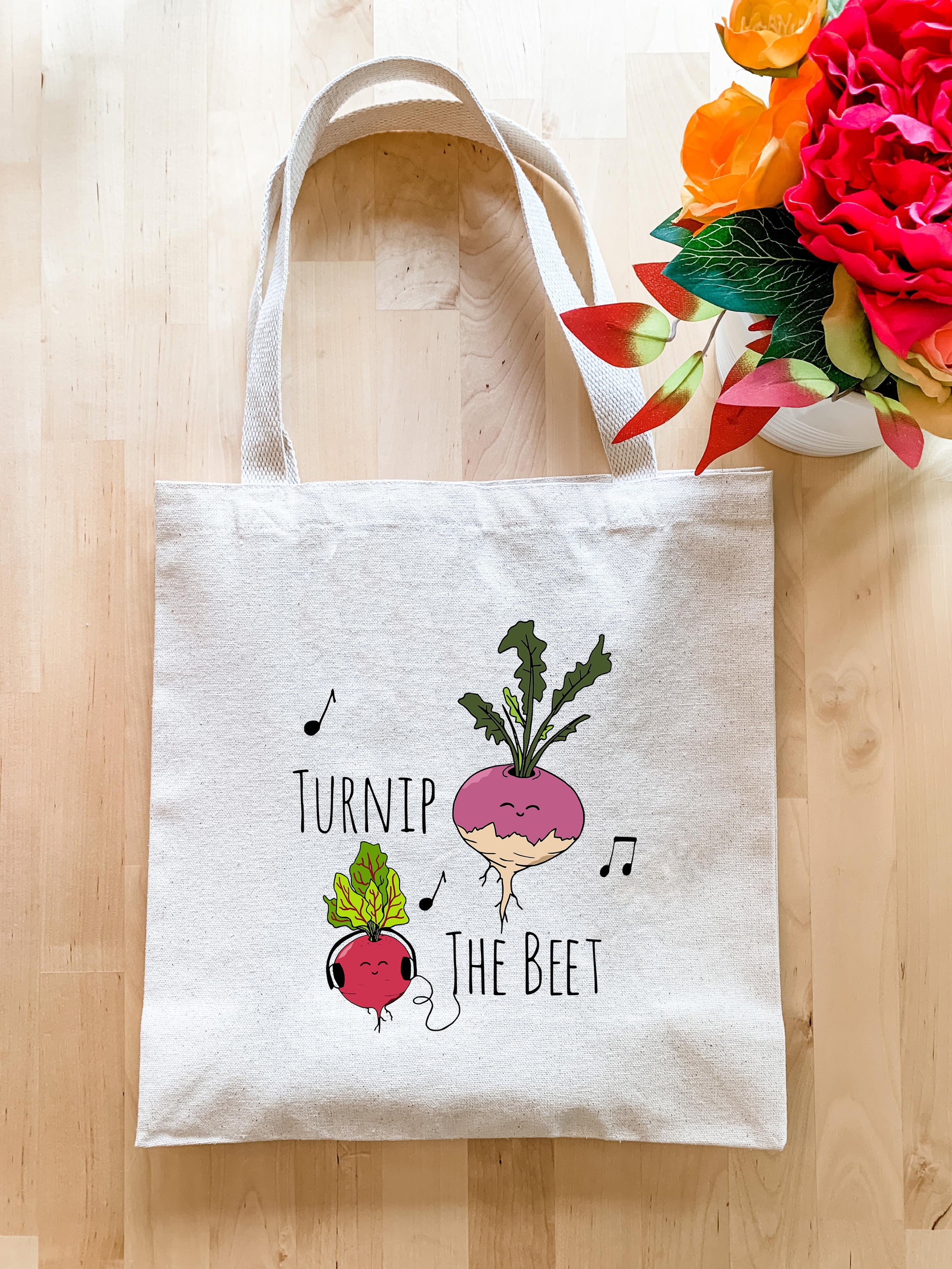 a white tote bag with turnip the beet on it