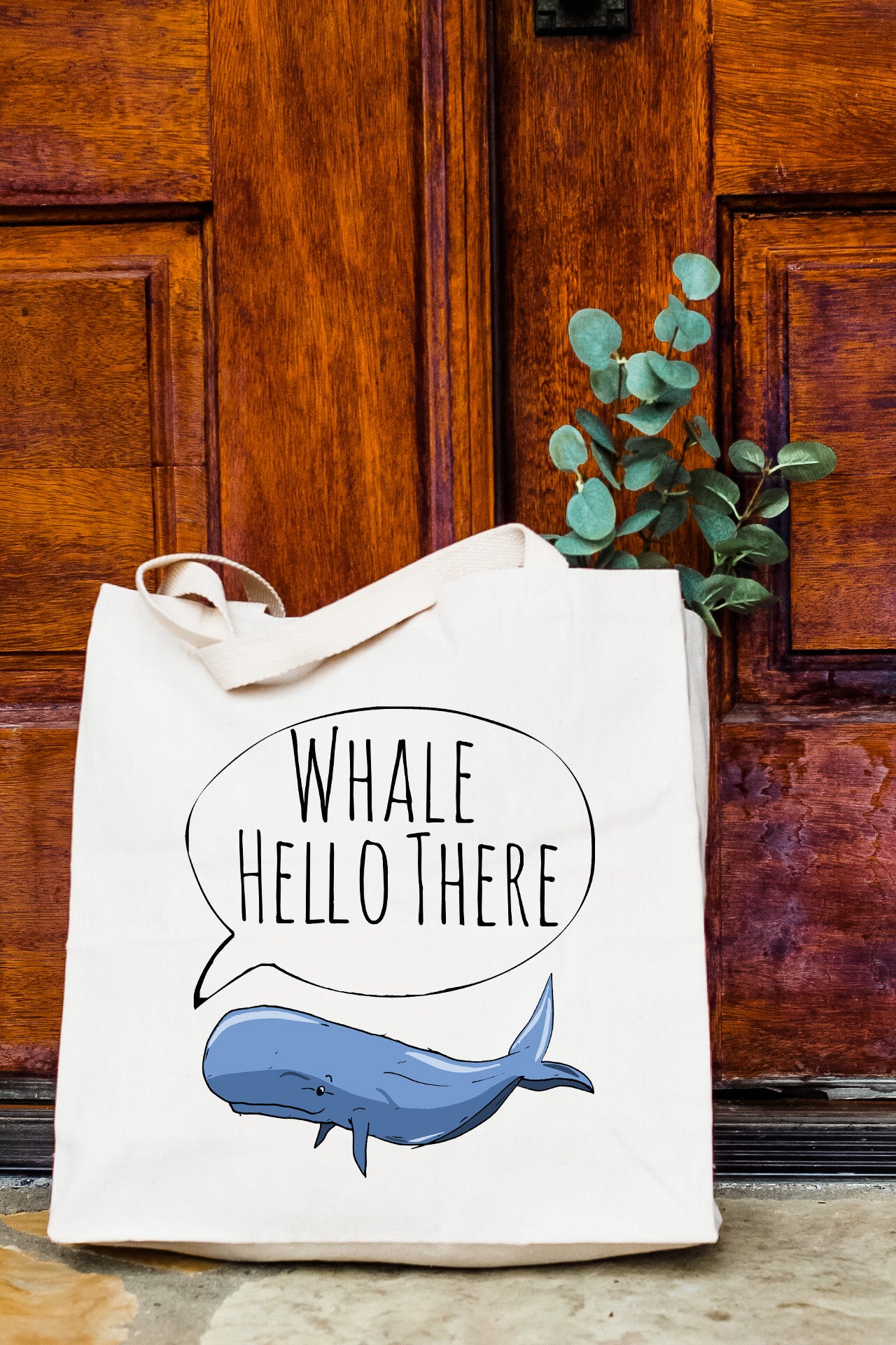 a white bag with a whale saying whale hello there