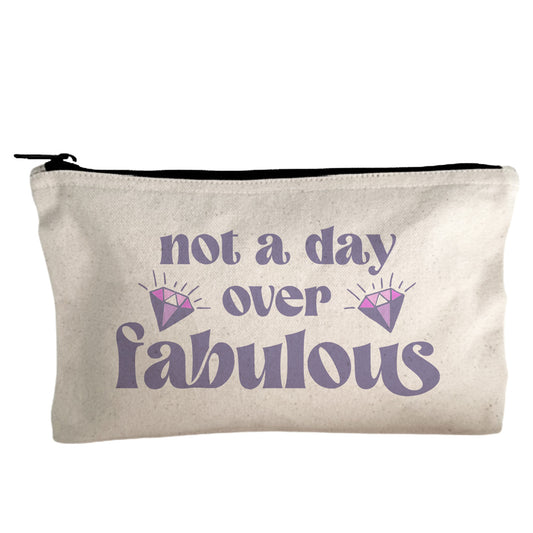 a white bag with the words not a day over fabulous on it