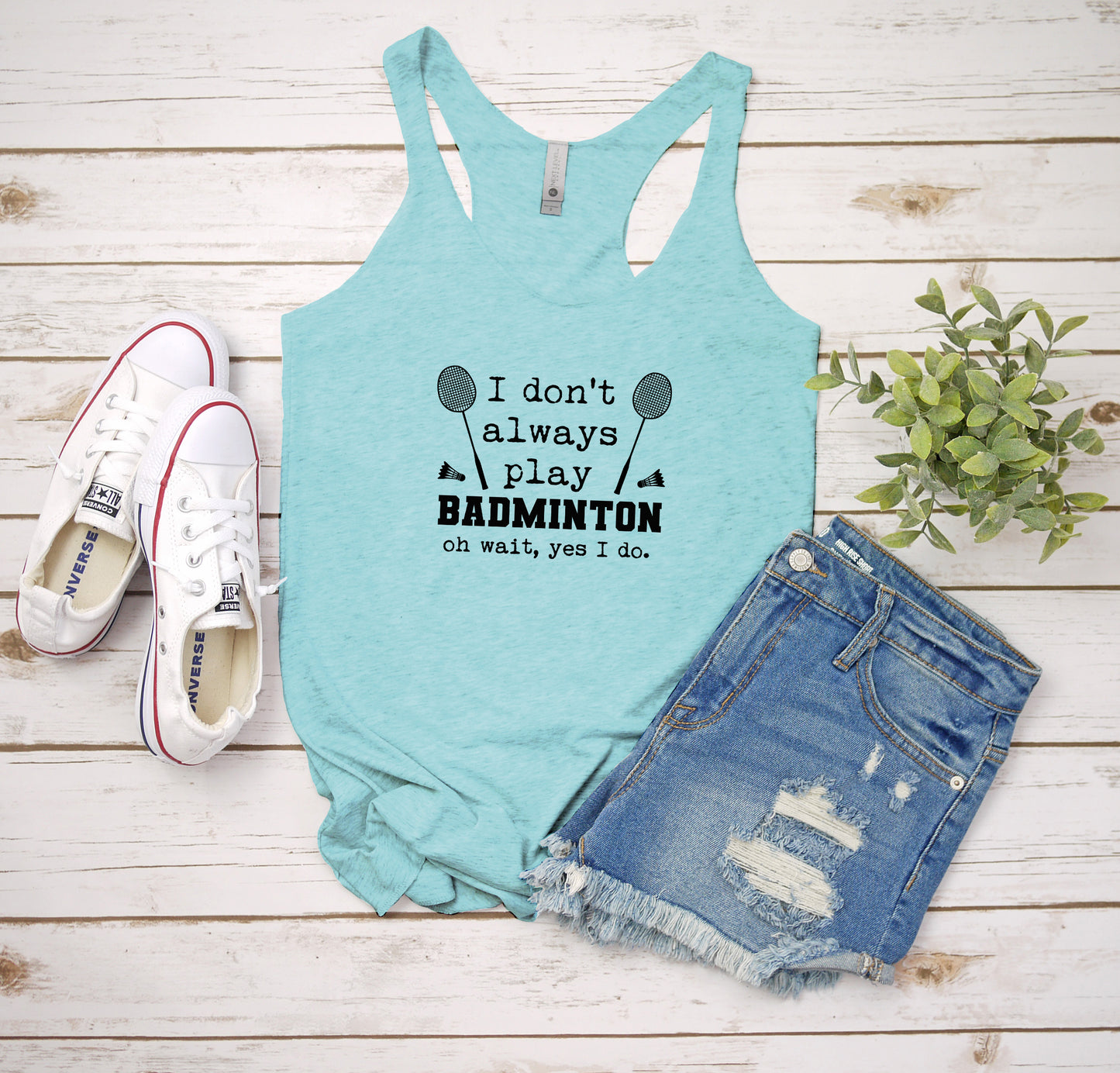 a women's tank top that says i don't always play badminton on