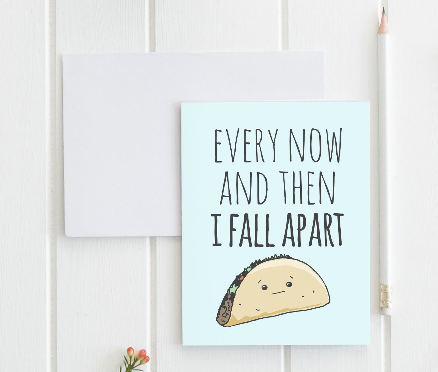 a card with a picture of a taco on it