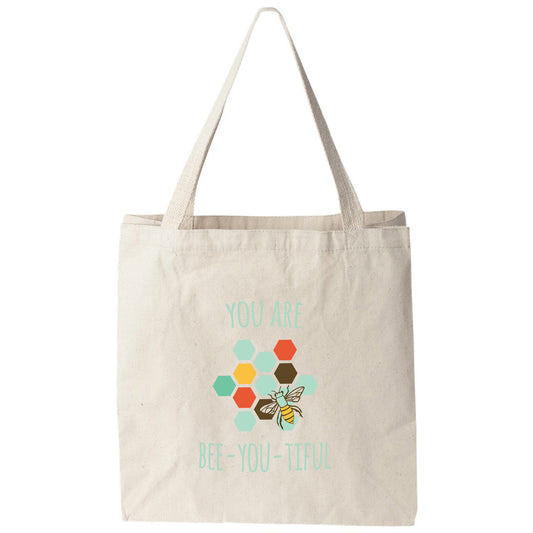 a tote bag with a bee on it