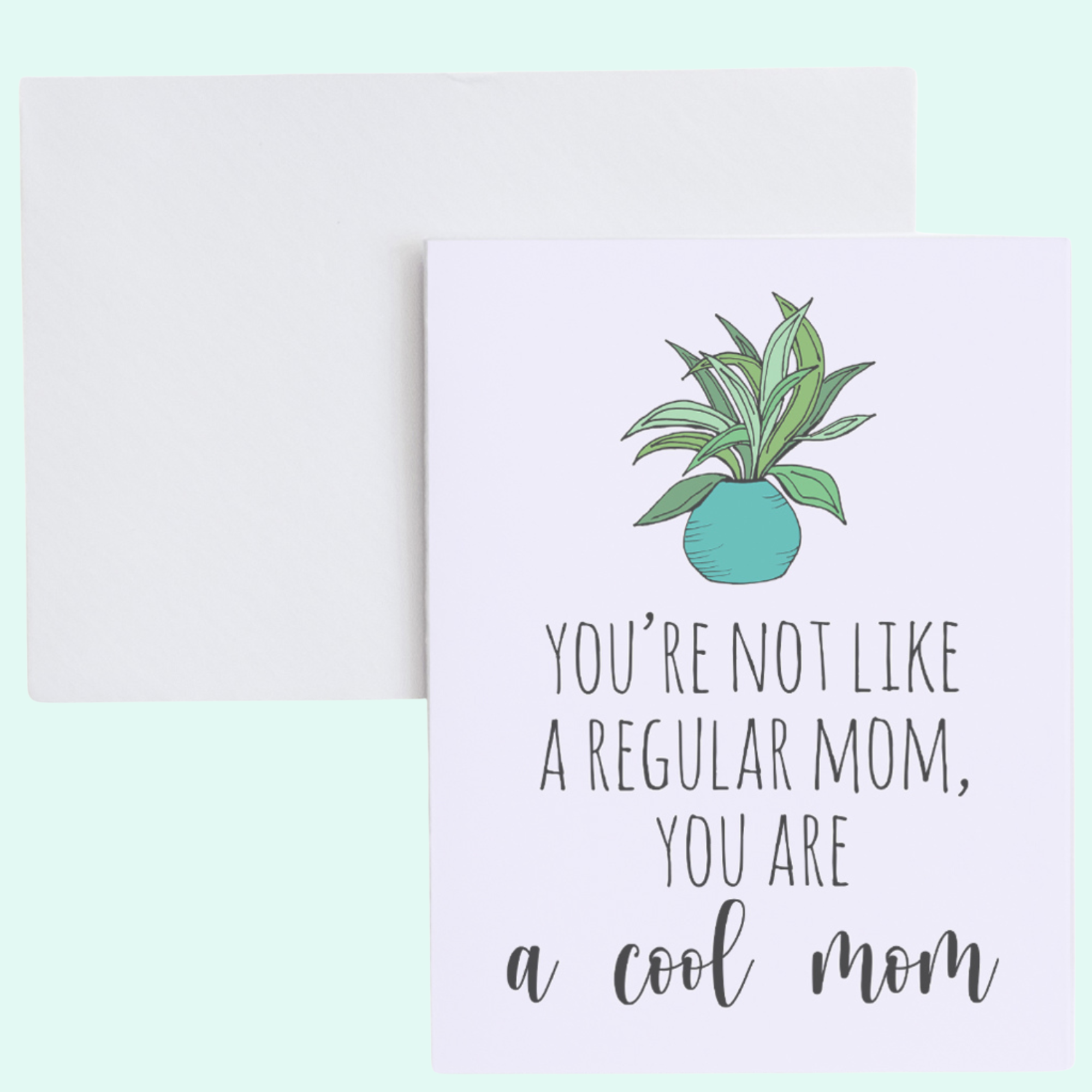 a card with a potted plant on top of it