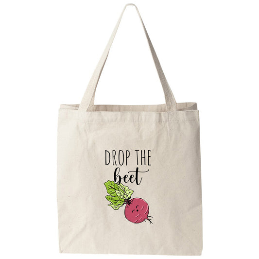 a tote bag that says drop the beet