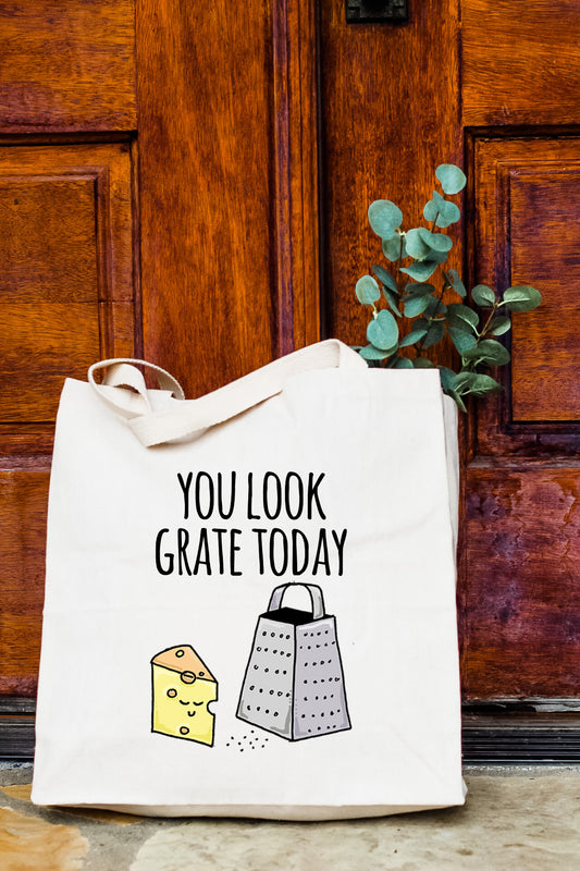 a tote bag sitting on the ground next to a door