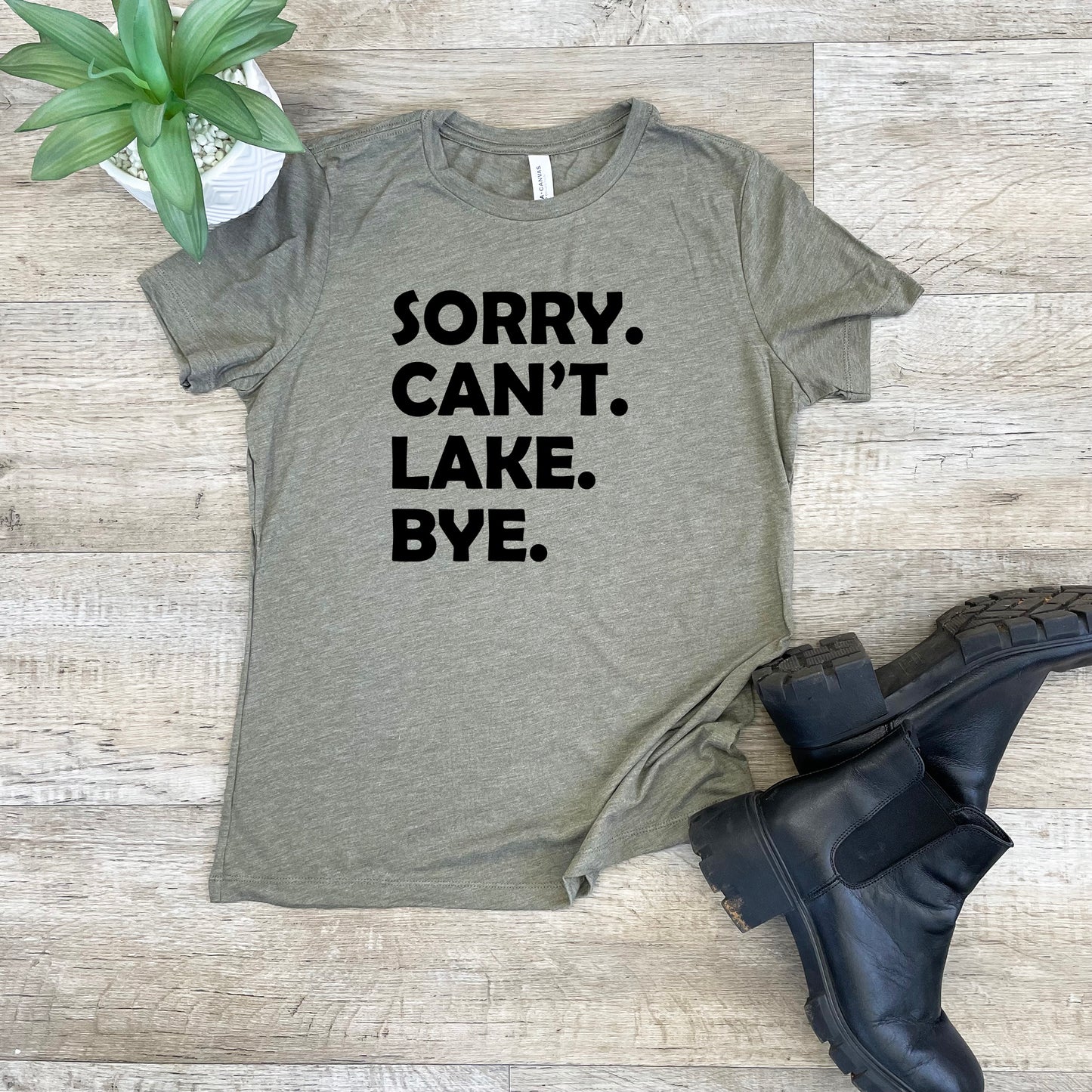 a t - shirt that says sorry can't lake bye