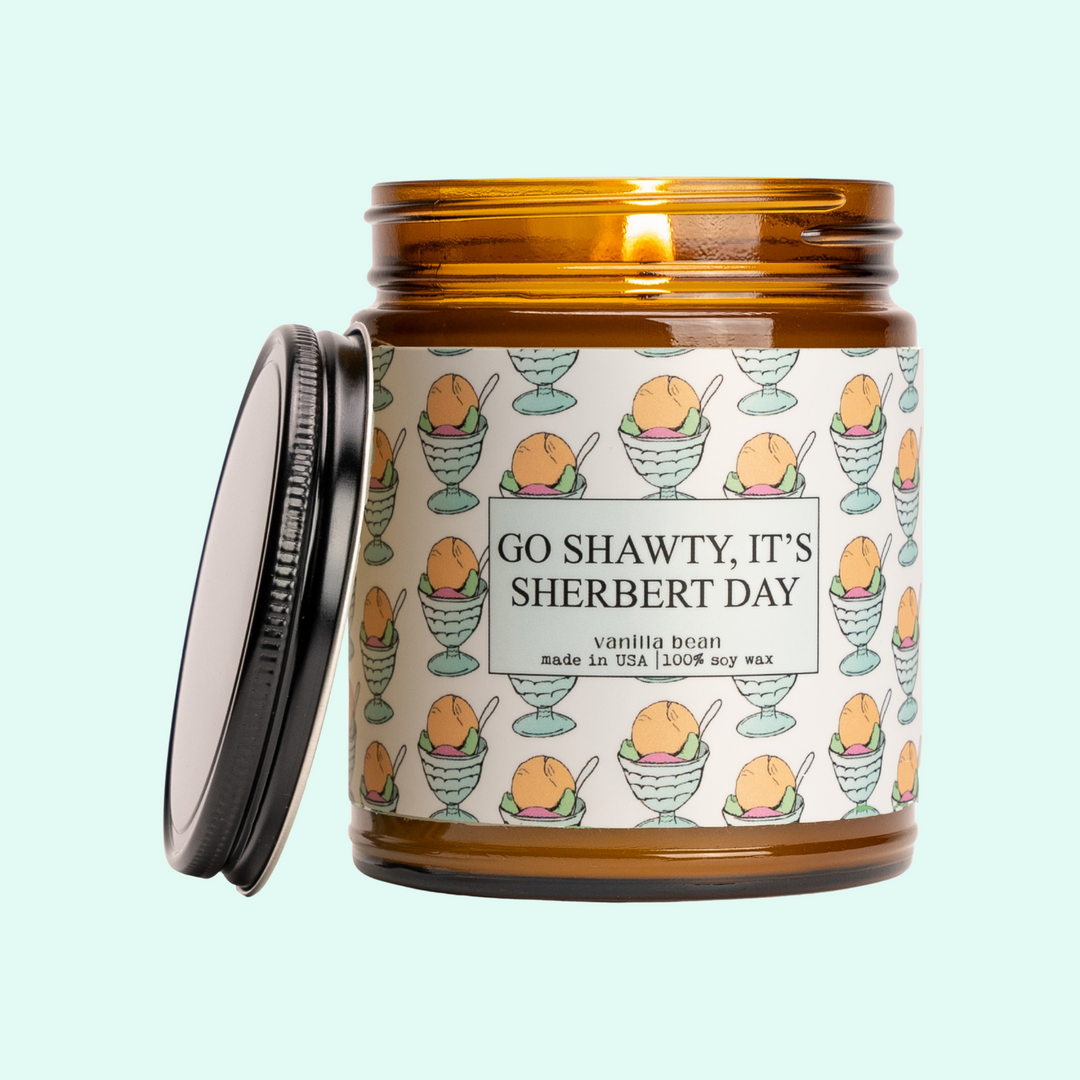 a jar of go shawty it's sherbert day candle
