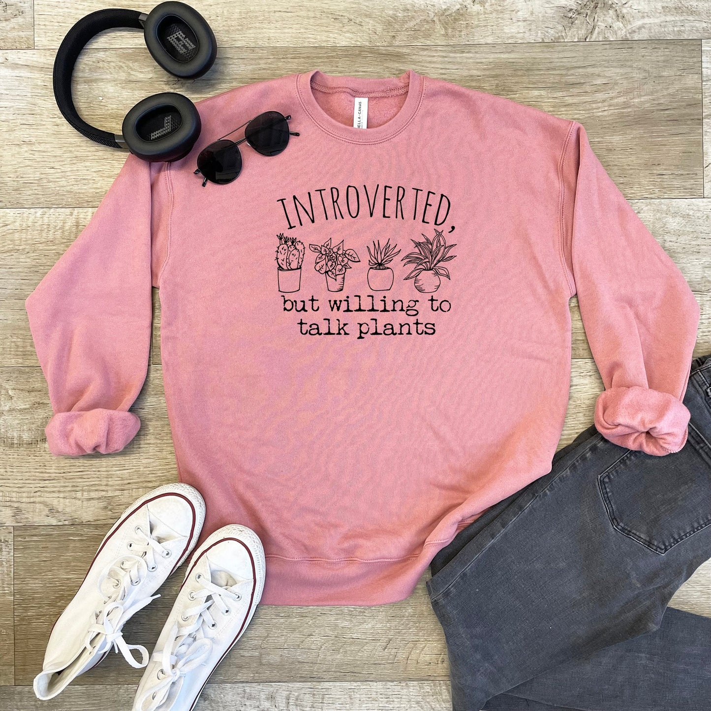 a pink sweatshirt that says, i'm involved but will not talk plants