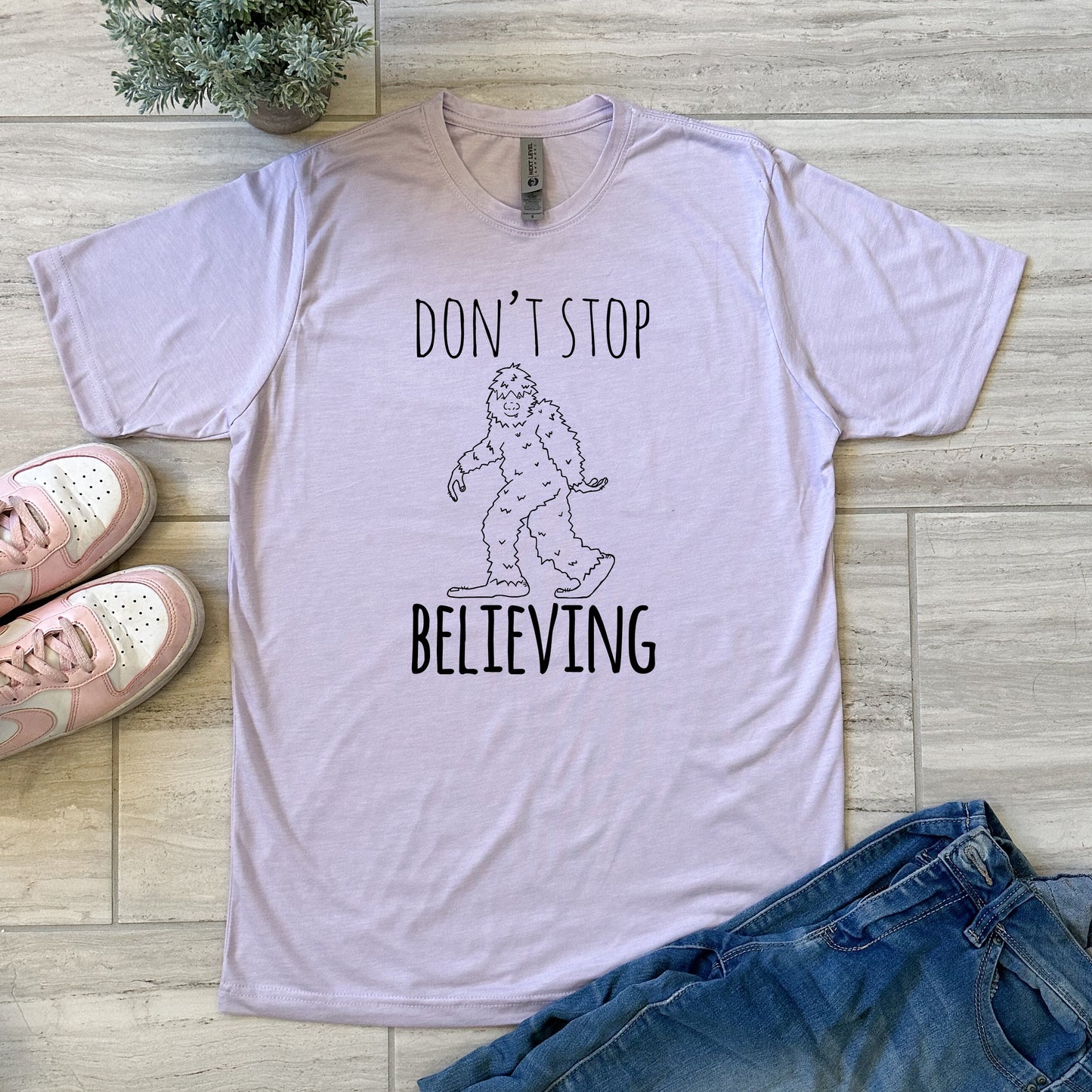 Don't Stop Believing (Bigfoot/ Sasquatch) - Men's / Unisex Tee - Stonewash Blue, Sage, Lavender, or Heather Gray