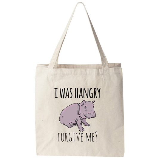 a tote bag with a hippo saying i was hungry for give me?