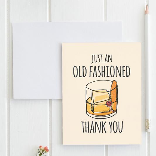 a card with a picture of a glass of whiskey on it