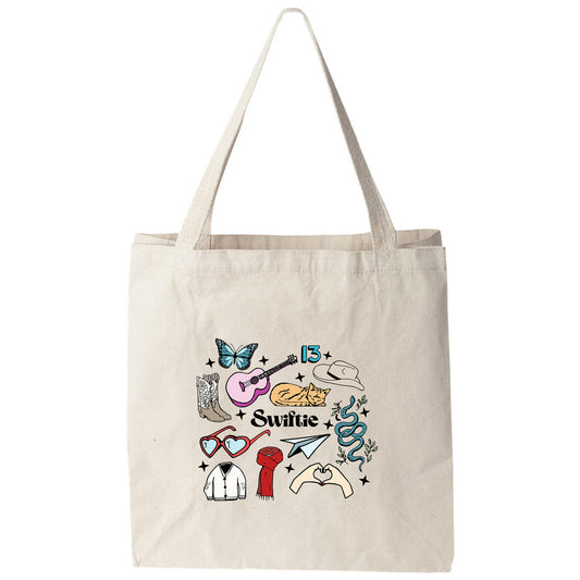 a white tote bag with various items on it