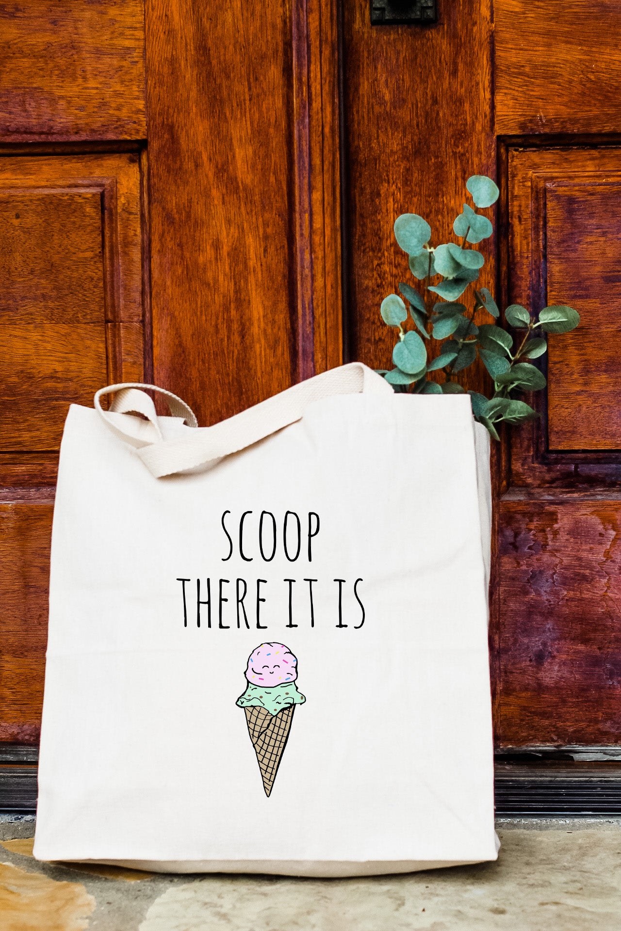 a white bag with a picture of an ice cream cone on it