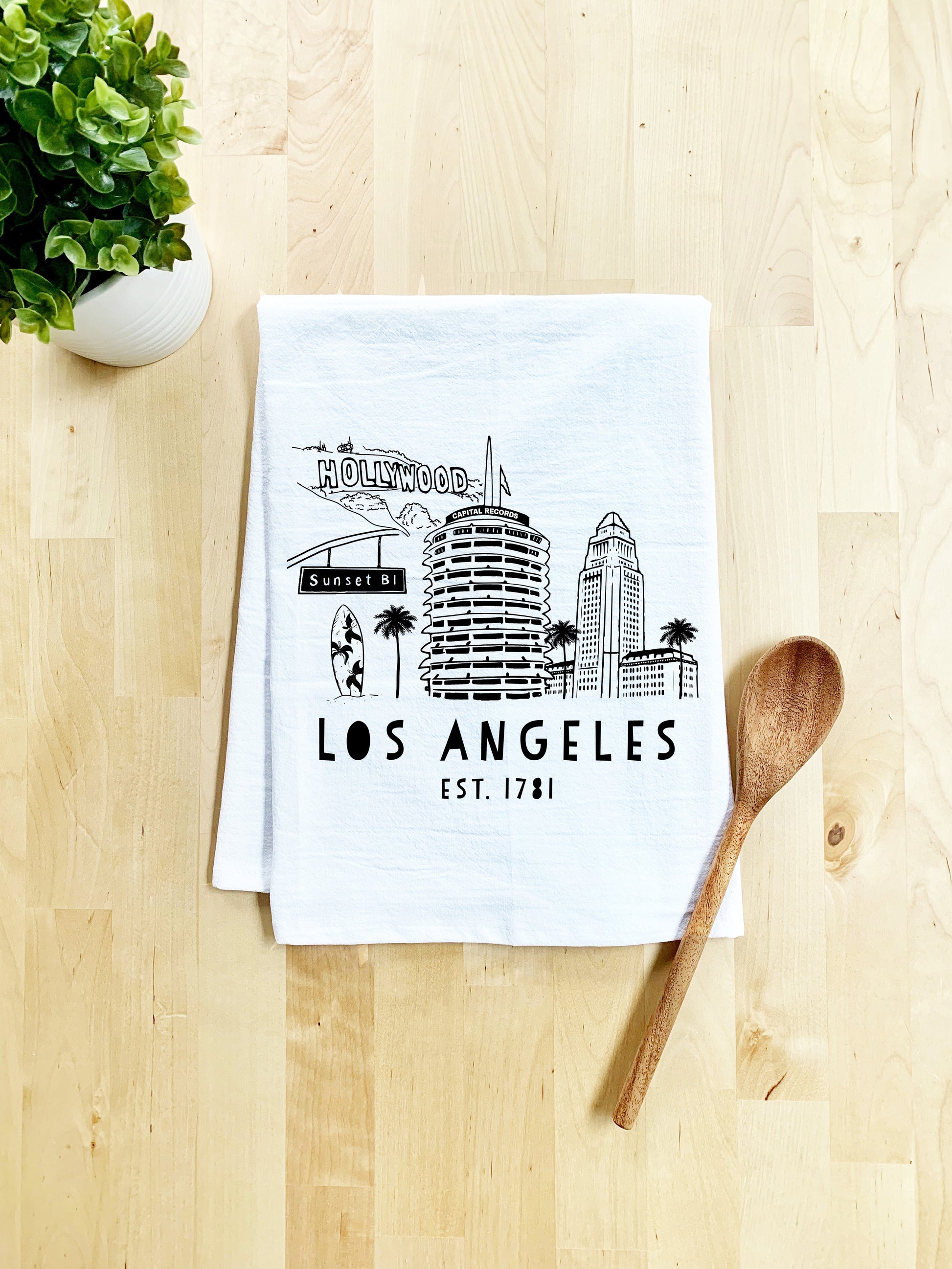 a tea towel with the los angeles skyline on it