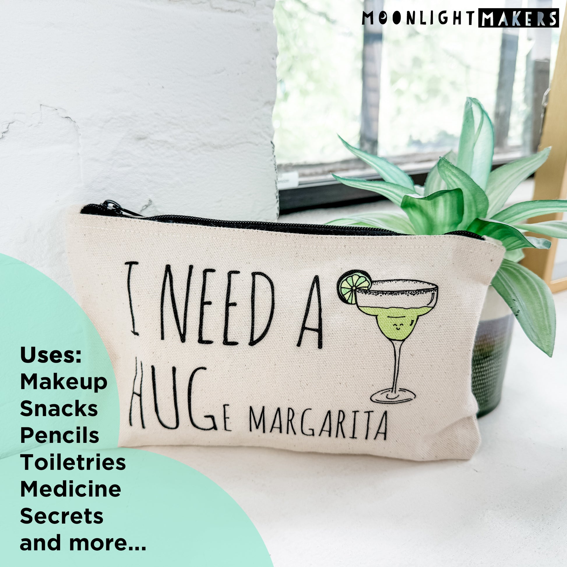 a cosmetic bag with the words i need a hug margarita on it