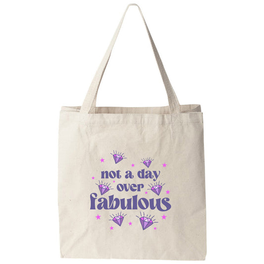 a tote bag that says not a day over fabulous