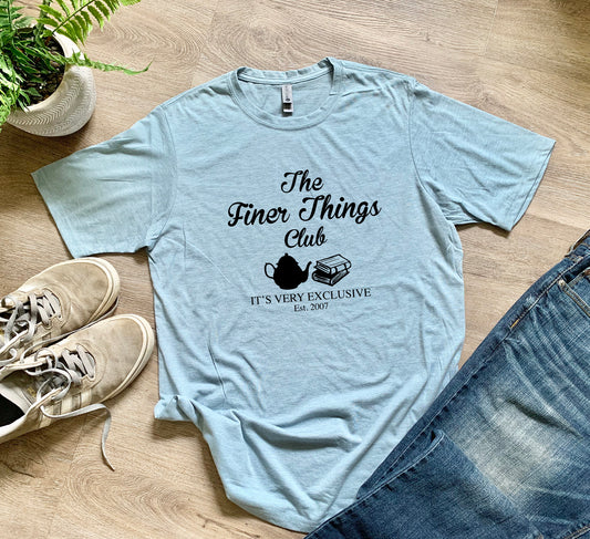 a t - shirt that says the finer things club on it