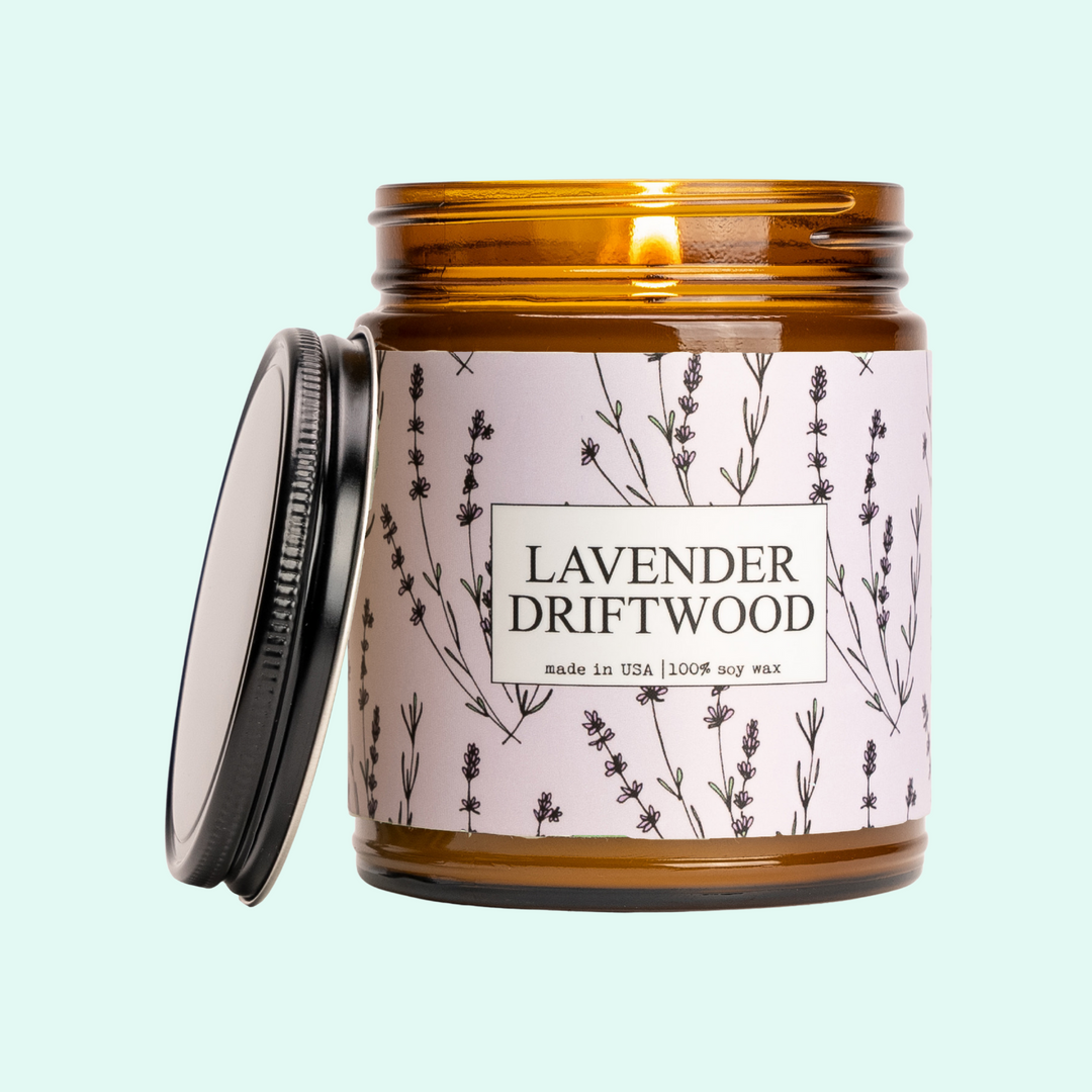 a jar of lavender driftwood candle with a lid