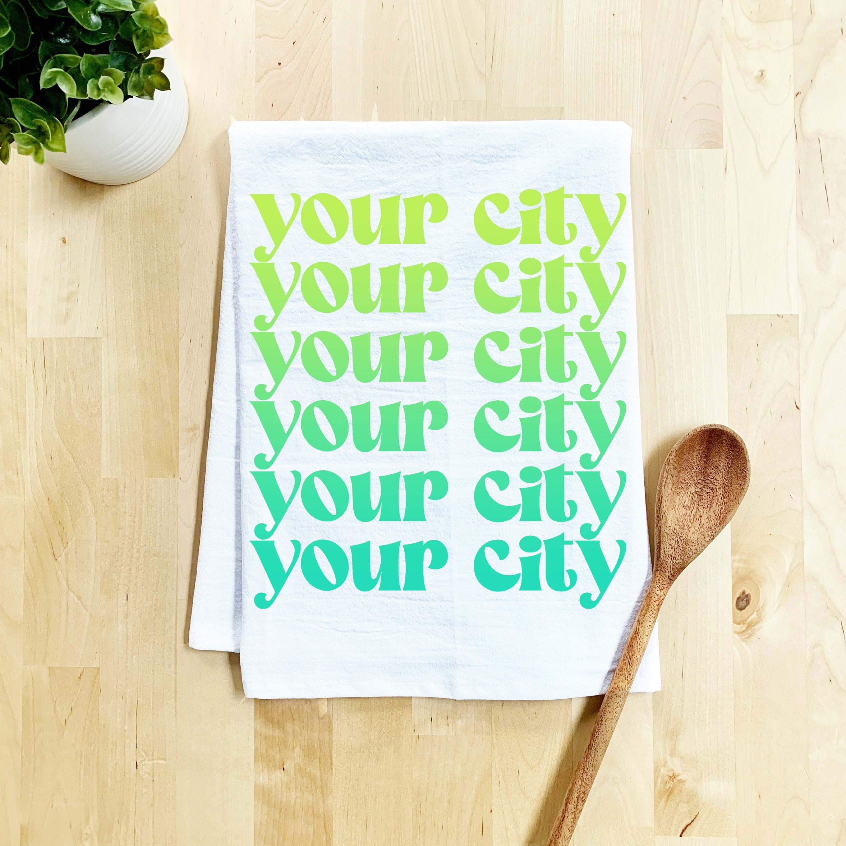 a tea towel that says your city is your city