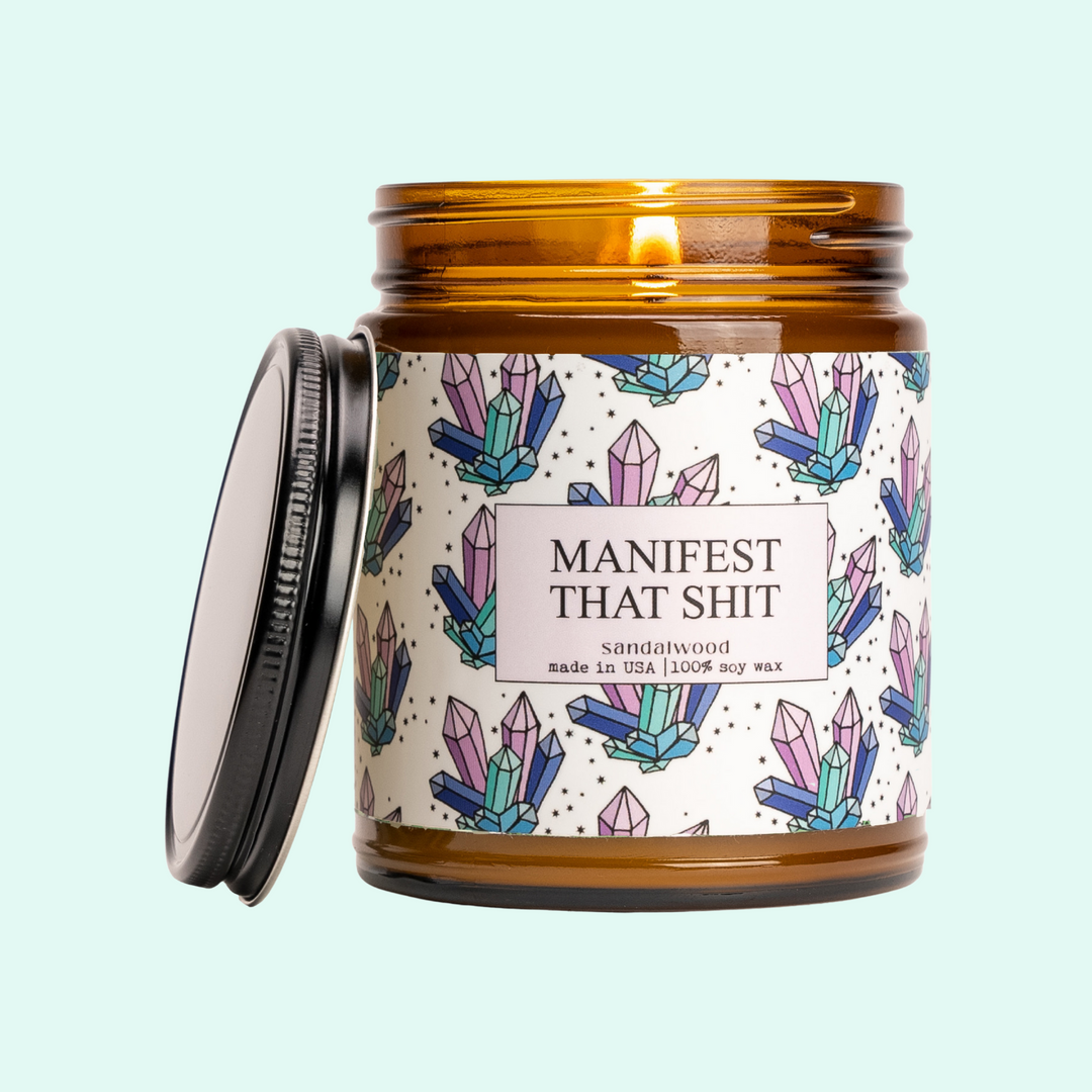 a jar with a candle inside of it