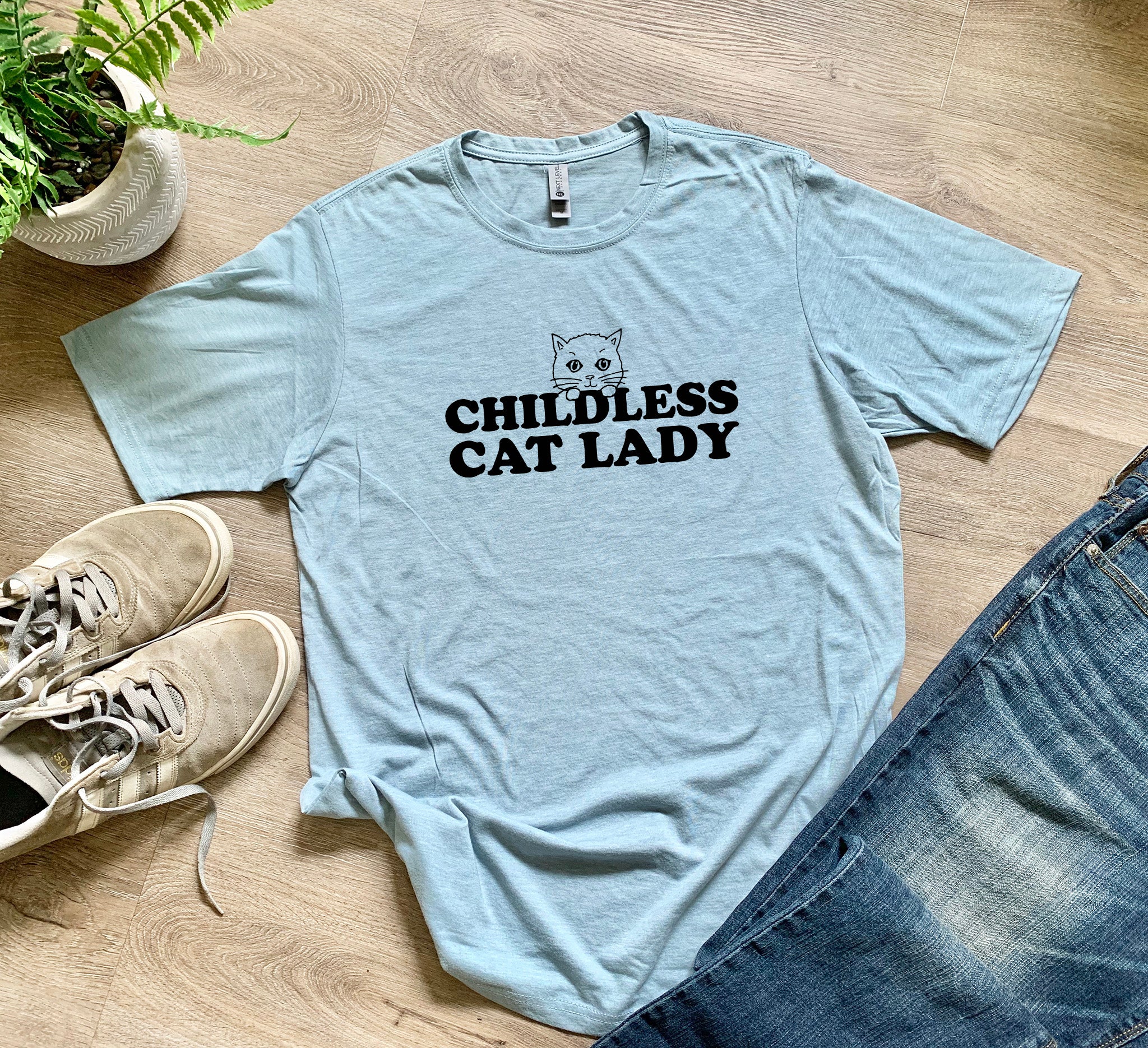 a t - shirt that says, childless cat lady