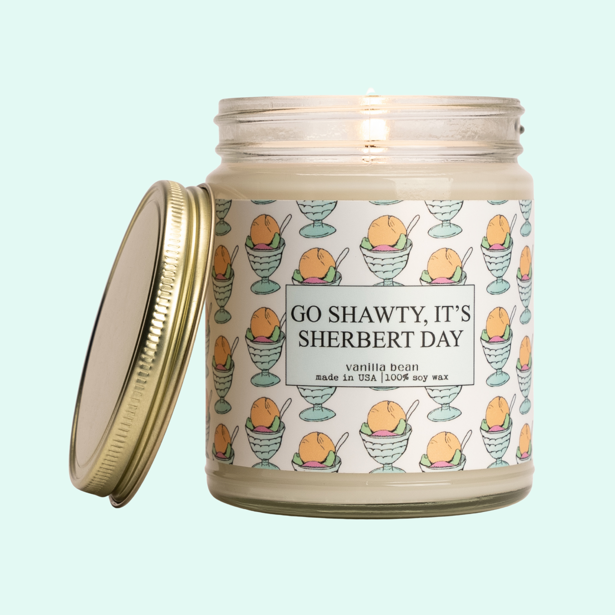 a jar of go shawly, it's sherbet day candle