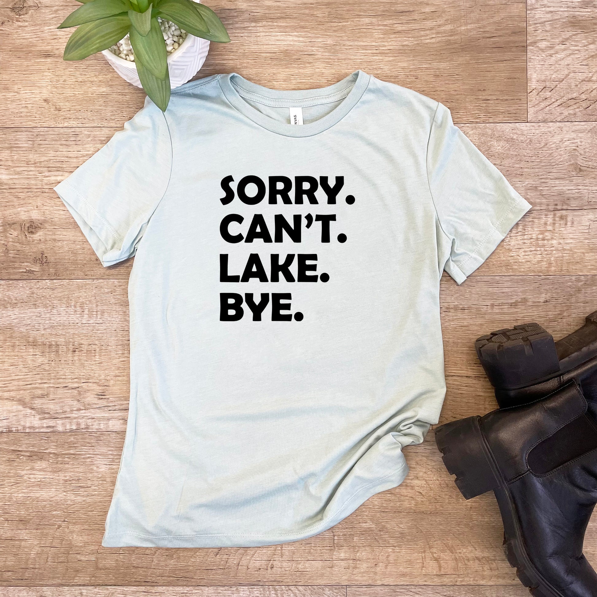 a t - shirt that says sorry can't lake bye