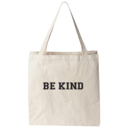a white tote bag with the words be kind printed on it
